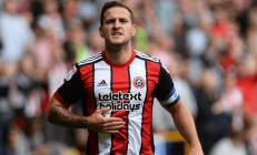 开云体育中国官网-包含谢菲联连胜豪强，英超赛场上异军突起的词条